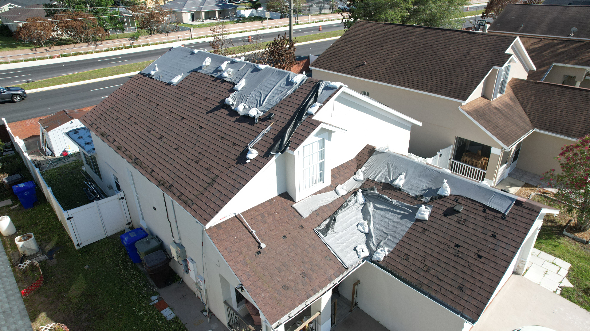 Before — Roof replacement with solar panel reinstall
